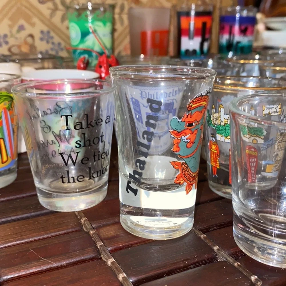 Set of 31 shot glass from different states and countries